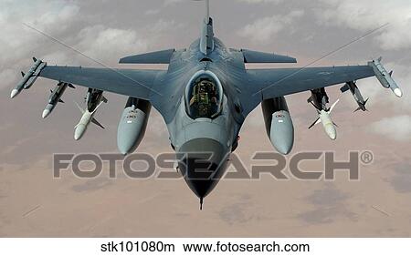 An F-16 Fighting Falcon flies a mission in the skies near Iraq. View Large Photo Image Picture - An F-16 Fighting Falcon flies a mission in the skies near Iraq.. Fotosearch