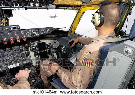 An F-16 Fighting Falcon flies past the window of a pilot. View Large Photo Image Picture - An F-16 Fighting Falcon flies past the window of a pilot.. Fotosearch
