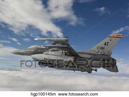 An F-16 Fighting Falcon flies with an AGM-65 Maverick missile. View Large Photo Image Picture - An F-16 Fighting Falcon flies with an AGM-65 Maverick missile.. Fotosearch