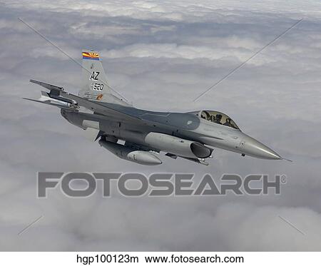 Picture - An F-16 Fighting Falcon maneuvers during a training mission.. Fotosearch