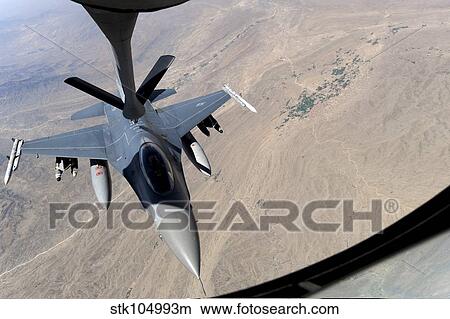 Picture - An F-16 Fighting Falcon receives fuel from a KC-135 Stratotanker.. Fotosearch