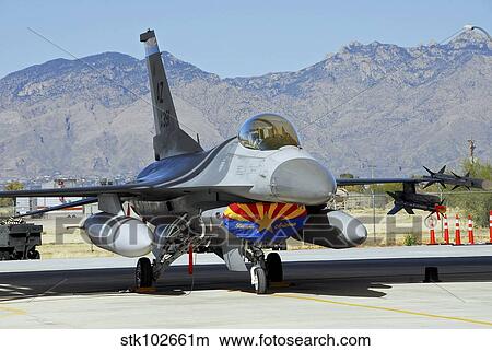 An F-16 Fighting Falcon sits ready to deploy. View Large Photo Image Picture - An F-16 Fighting Falcon sits ready to deploy.. Fotosearch