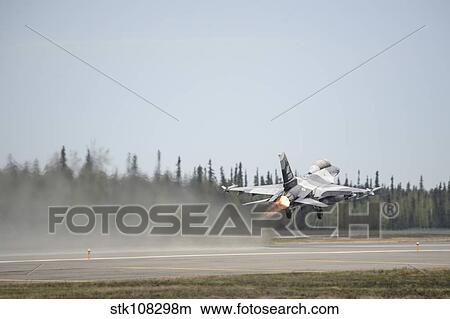 Picture - An F-16 Fighting Falcon takes off Eielson Air Force Base.. Fotosearch