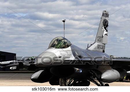 An F-16 Fighting Falcon taxis out for a training mission. View Large Photo Image Picture - An F-16 Fighting Falcon taxis out for a training mission.. Fotosearch