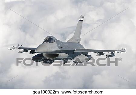 An F-16 from the Colorado Air National Guard in flight over Brazil. View Large Photo Image Picture - An F-16 from the Colorado Air National Guard in flight over Brazil.. Fotosearch