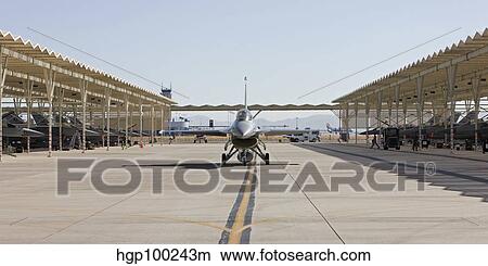 An F-16 pilot taxi's his aircraft at an airbase in Arizona. View Large Photo Image Picture - An F-16 pilot taxi's his aircraft at an airbase in Arizona.. Fotosearch
