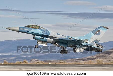 An F-16A Fighting Falcon of the famous US Navy TOPGUN Naval Fighter Weapons School. View Large Photo Image Picture - An F-16A Fighting Falcon of the famous US Navy TOPGUN Naval Fighter Weapons School.. Fotosearch