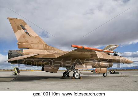 An F-16A Fighting Falcon of the famous US Navy TOPGUN Naval Fighter Weapons School. View Large Photo Image Picture - An F-16A Fighting Falcon of the famous US Navy TOPGUN Naval Fighter Weapons School.. Fotosearch