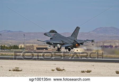 An F-16A Fighting Falcon of the Royal Danish Air Force taking off. View Large Photo Image Picture - An F-16A Fighting Falcon of the Royal Danish Air Force taking off.. Fotosearch