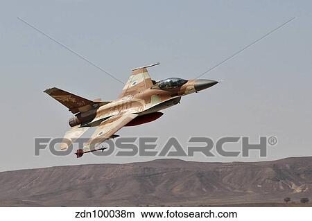 An F-16A Netz of the Israeli Air Force in flight over Israel. View Large Photo Image Picture - An F-16A Netz of the Israeli Air Force in flight over Israel.. Fotosearch
