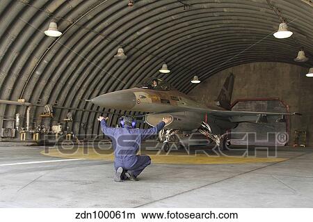 An F-16A Netz of the Israeli Air Force in its hardened aircraft shelter. View Large Photo Image Picture - An F-16A Netz of the Israeli Air Force in its hardened aircraft shelter.. Fotosearch