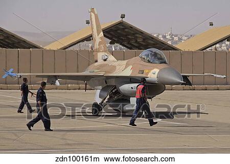 An F-16A Netz of the Israeli Air Force under inspection before take-off. View Large Photo Image Picture - An F-16A Netz of the Israeli Air Force under inspection before take-off.. Fotosearch