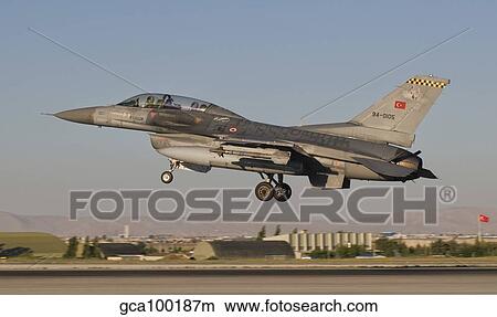 An F-16B of the Turkish Air Force takes off from Konya Air Base. View Large Photo Image Picture - An F-16B of the Turkish Air Force takes off from Konya Air Base.. Fotosearch