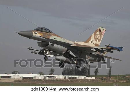 An F-16C Barak of the Israeli Air Force landing at Hatzor Air Force Base. View Large Photo Image Picture - An F-16C Barak of the Israeli Air Force landing at Hatzor Air Force Base.. Fotosearch