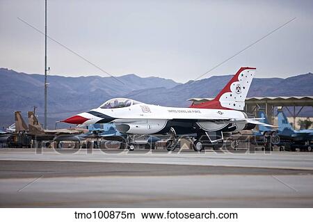 An F-16C Thunderbird taxis to the runway at Nellis Air Force Base, Nevada. View Large Photo Image Picture - An F-16C Thunderbird taxis to the runway at Nellis Air Force Base, Nevada.. Fotosearch