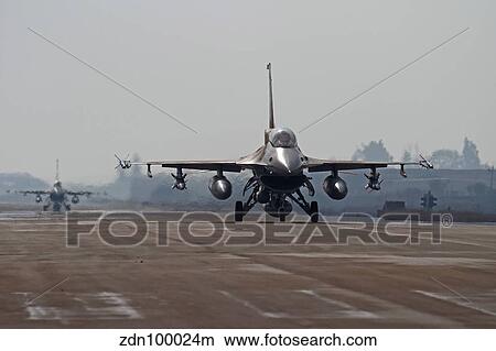 An F-16D Barak of the Israeli Air Force taxiing on the runway. View Large Photo Image Picture - An F-16D Barak of the Israeli Air Force taxiing on the runway.. Fotosearch