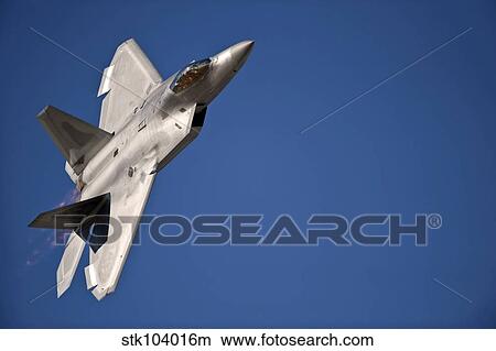 An F-22 Raptor aircraft performs during Aviation Nation 2010. View Large Photo Image Picture - An F-22 Raptor aircraft performs during Aviation Nation 2010.. Fotosearch