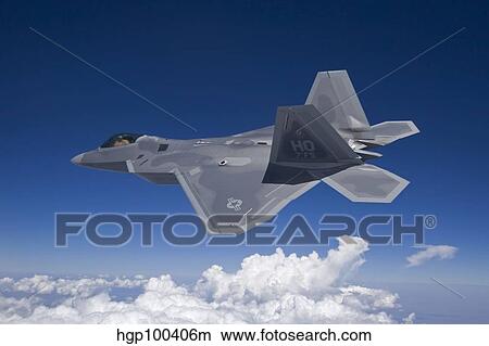 An F-22 Raptor flies around Southern New Mexico. View Large Photo Image Picture - An F-22 Raptor flies around Southern New Mexico.. Fotosearch