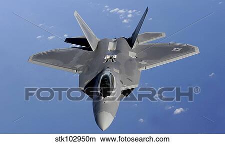 Picture - An F-22 Raptor moves into position to receive fuel.. Fotosearch