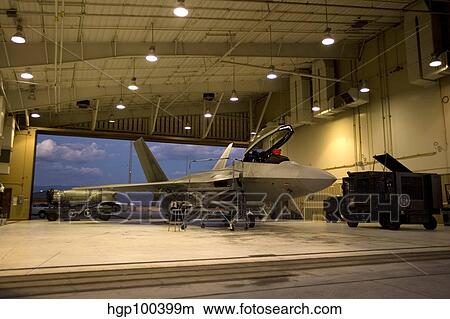 An F-22 Raptor parked in the hangar at Holloman Air Force Base. View Large Photo Image Picture - An F-22 Raptor parked in the hangar at Holloman Air Force Base.. Fotosearch