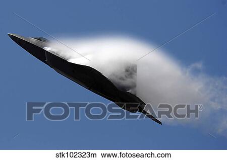 Picture - An F-22 Raptor performs during an air show.. Fotosearch