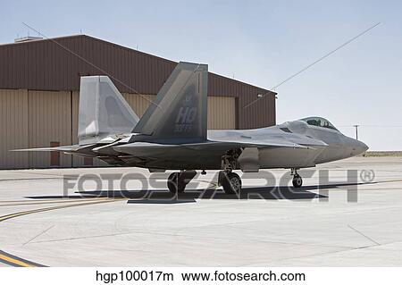An F-22 Raptor taxi's to the runway for a training mission. View Large Photo Image Picture - An F-22 Raptor taxi's to the runway for a training mission.. Fotosearch