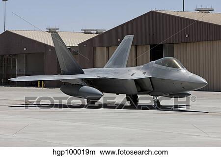 An F-22 Raptor taxi's to the runway for a training mission. View Large Photo Image Picture - An F-22 Raptor taxi's to the runway for a training mission.. Fotosearch