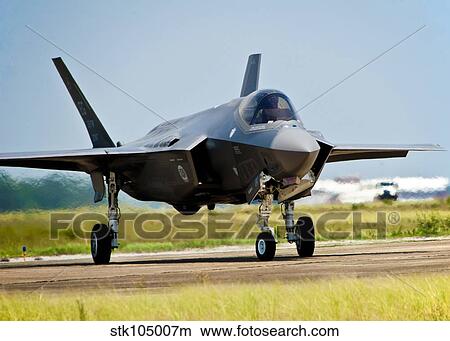 An F-35 Lightning II taxiing at Eglin Air Force Base, Florida. View Large Photo Image Picture - An F-35 Lightning II taxiing at Eglin Air Force Base, Florida.. Fotosearch