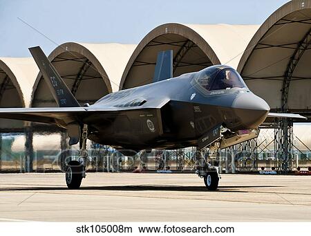 An F-35 Lightning II taxiing at Eglin Air Force Base, Florida. View Large Photo Image Picture - An F-35 Lightning II taxiing at Eglin Air Force Base, Florida.. Fotosearch