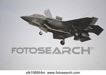 An F-35B Lightning II Joint Strike Fighter prepares to make a vertical landing. View Large Photo Image Picture - An F-35B Lightning II Joint Strike Fighter prepares to make a vertical landing.. Fotosearch