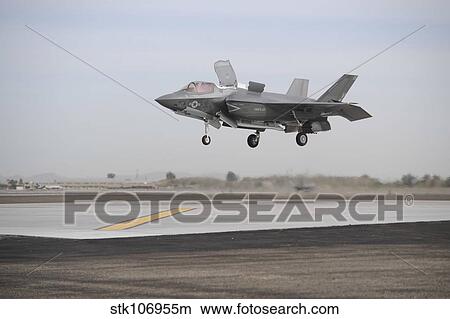 An F-35B Lightning II Joint Strike Fighter prepares to make a vertical landing. View Large Photo Image Picture - An F-35B Lightning II Joint Strike Fighter prepares to make a vertical landing.. Fotosearch