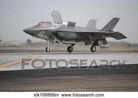 An F-35B Lightning II Joint Strike Fighter prepares to make a vertical landing. View Large Photo Image Picture - An F-35B Lightning II Joint Strike Fighter prepares to make a vertical landing.. Fotosearch