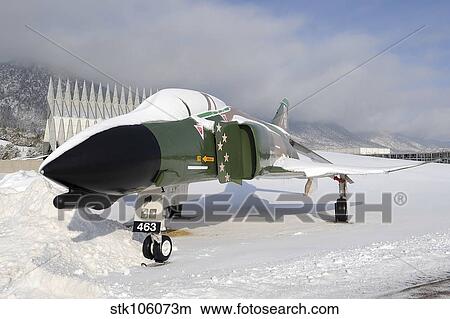 An F-4D Phantom II aircraft static display covered in snow. View Large Photo Image Picture - An F-4D Phantom II aircraft static display covered in snow.. Fotosearch