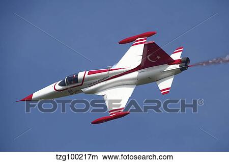 An F-5 jet of the Turkish Stars aerobatic demonstration team. View Large Photo Image Picture - An F-5 jet of the Turkish Stars aerobatic demonstration team.. Fotosearch