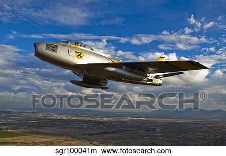 An F-86 Sabre jet in flight. View Large Photo Image Picture - An F-86 Sabre jet in flight.. Fotosearch
