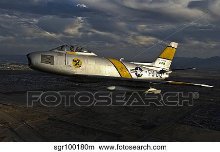 An F-86F Sabre in flight near Glendale, California. View Large Photo Image Picture - An F-86F Sabre in flight near Glendale, California.. Fotosearch