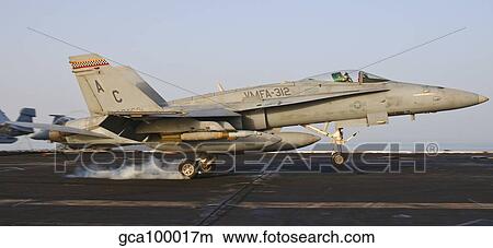 Picture - An F/A-18 Hornet lands aboard USS Harry S. Truman.. Fotosearch