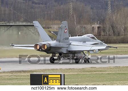 An F/A-18 Hornet of the Swiss Air Force on the runway. View Large Photo Image Picture - An F/A-18 Hornet of the Swiss Air Force on the runway.. Fotosearch
