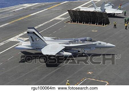 An F/A-18 Hornet of the U. S. Navy aboard USS Eisenhower. View Large Photo Image Picture - An F/A-18 Hornet of the U. S. Navy aboard USS Eisenhower.. Fotosearch