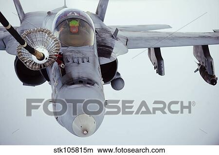 An F/A-18 Super Hornet receives fuel over Afghanistan. View Large Photo Image Picture - An F/A-18 Super Hornet receives fuel over Afghanistan.. Fotosearch