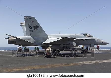 An F/A-18C Hornet during flight operations on USS Dwight D. Eisenhower. View Large Photo Image Picture - An F/A-18C Hornet during flight operations on USS Dwight D. Eisenhower.. Fotosearch