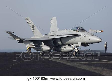 An F/A-18C Hornet during flight operations on USS Dwight D. Eisenhower. View Large Photo Image Picture - An F/A-18C Hornet during flight operations on USS Dwight D. Eisenhower.. Fotosearch