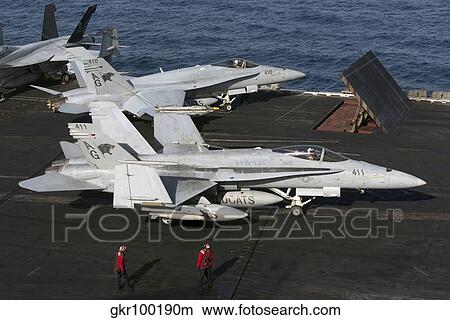 An F/A-18C Hornet during flight operations on USS Dwight D. Eisenhower. View Large Photo Image Picture - An F/A-18C Hornet during flight operations on USS Dwight D. Eisenhower.. Fotosearch