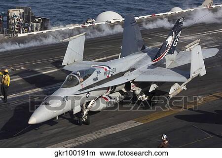 An F/A-18C Hornet during flight operations on USS Dwight D. Eisenhower. View Large Photo Image Picture - An F/A-18C Hornet during flight operations on USS Dwight D. Eisenhower.. Fotosearch
