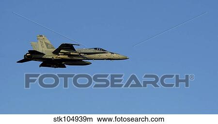 An F/A-18C Hornet in flight. View Large Photo Image Picture - An F/A-18C Hornet in flight.. Fotosearch
