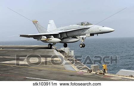 Picture - An F/A-18C Hornet launches from the aircraft carrier USS Harry S. Truman.. Fotosearch