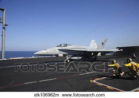 Picture - An F/A-18C Hornet launches from the flight deck of USS Dwight D. Eisenhower.. Fotosearch