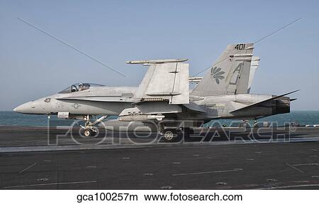 An F/A-18C Hornet on the flight deck of USS George H. W. Bush. View Large Photo Image Picture - An F/A-18C Hornet on the flight deck of USS George H. W. Bush.. Fotosearch