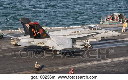 An F/A-18C Hornet ready to launch aboard USS George H. W. Bush. View Large Photo Image Picture - An F/A-18C Hornet ready to launch aboard USS George H. W. Bush.. Fotosearch