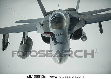 Picture - An F/A-18C Hornet receives fuel over Afghanistan.. Fotosearch